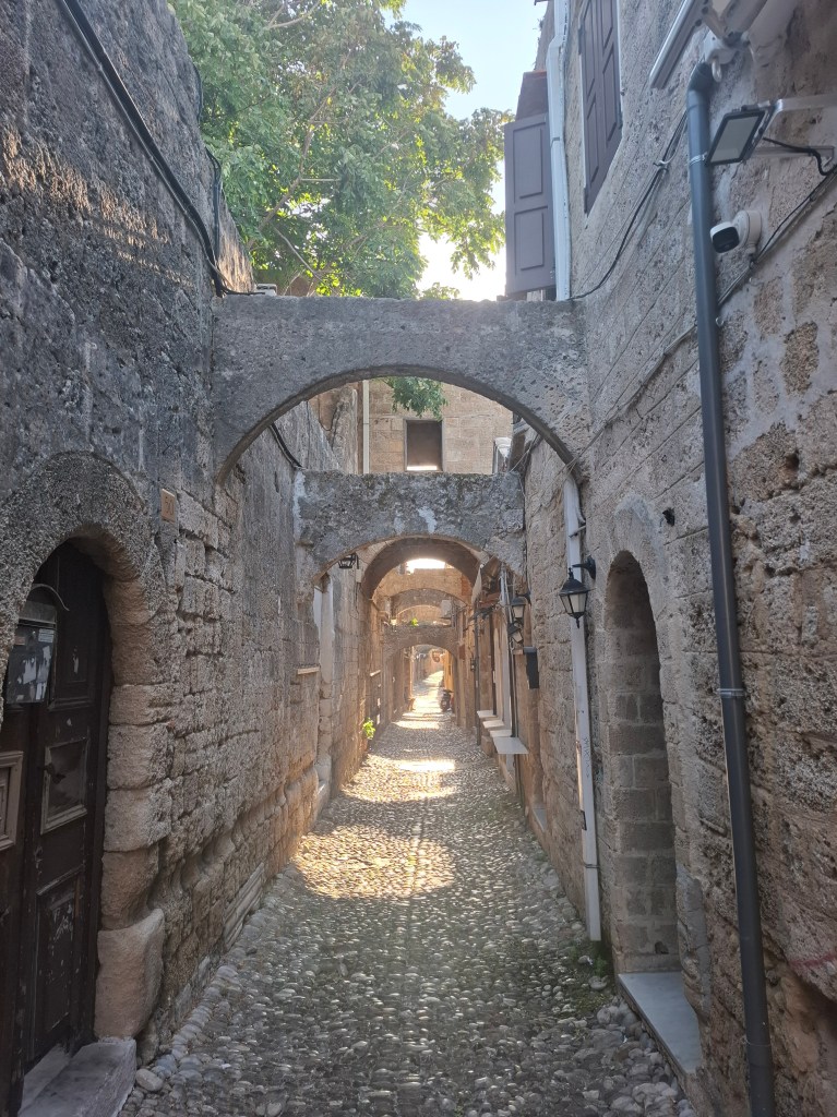 Pebbled street in Rhodes old town, Greece.