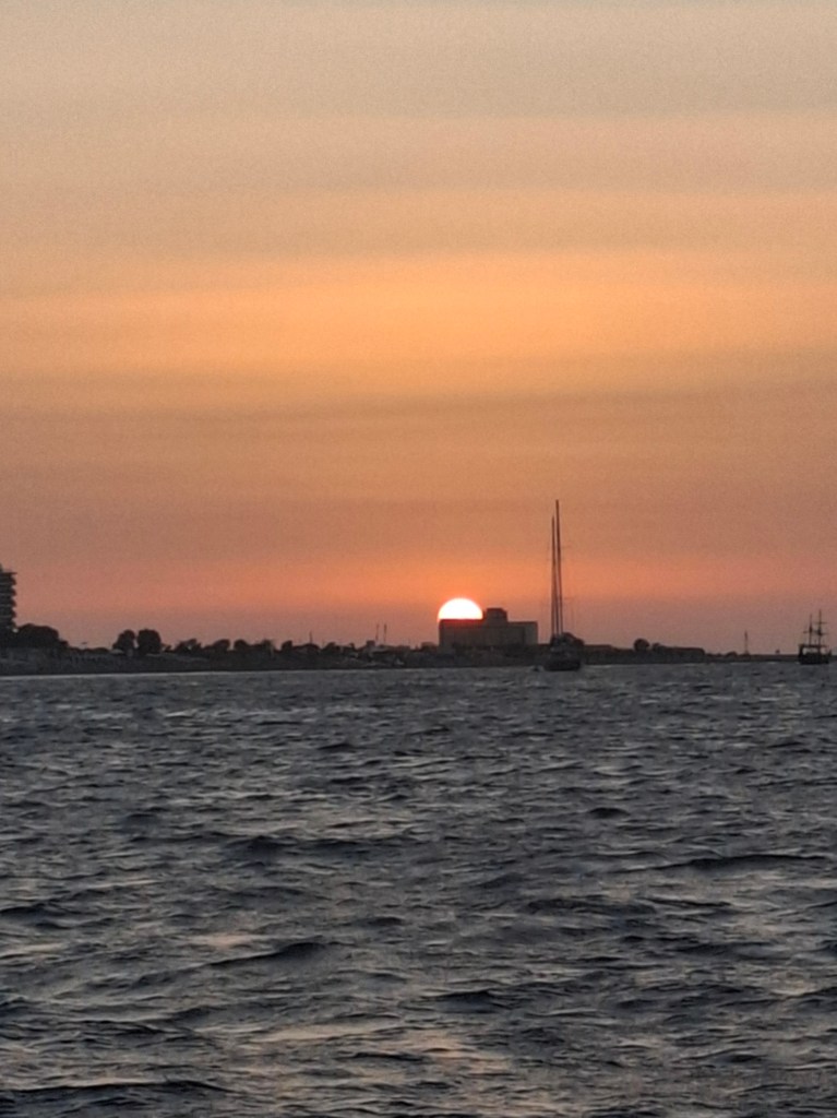 The sun setting in Rhodes, Greece.